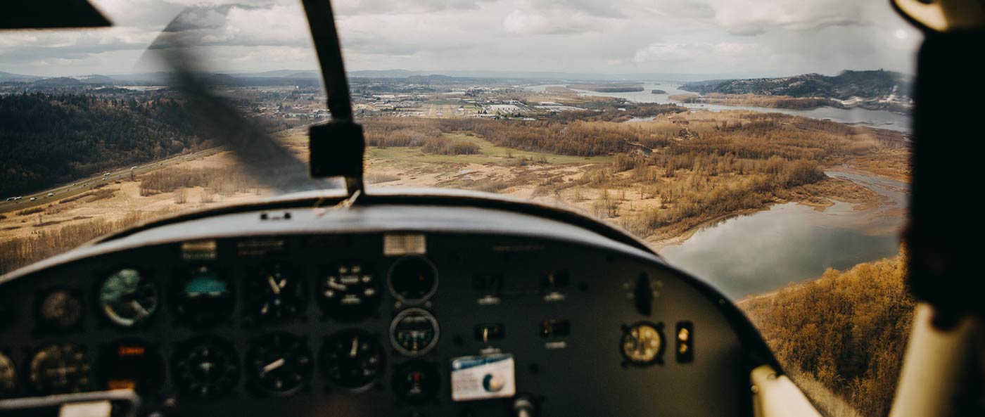 cockpit of airplane overlooking river gorge
