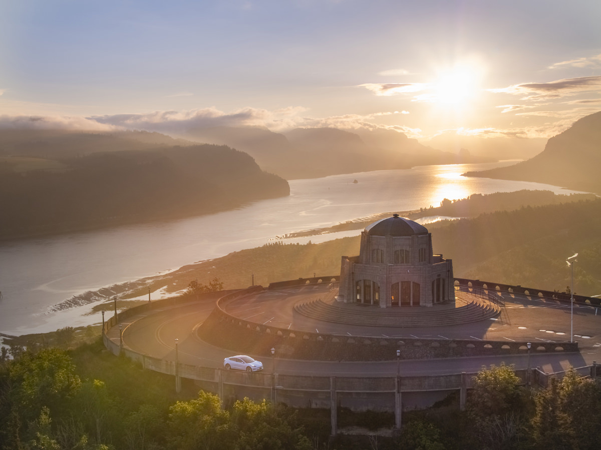 A view of Vista House overlooking the Columbia River at sunrise